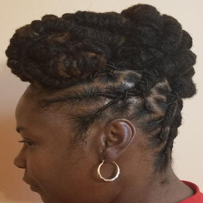 locs twisted and designed into a bun