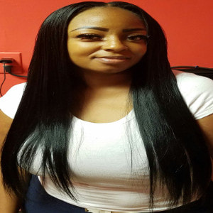 lady with long straight hair weave